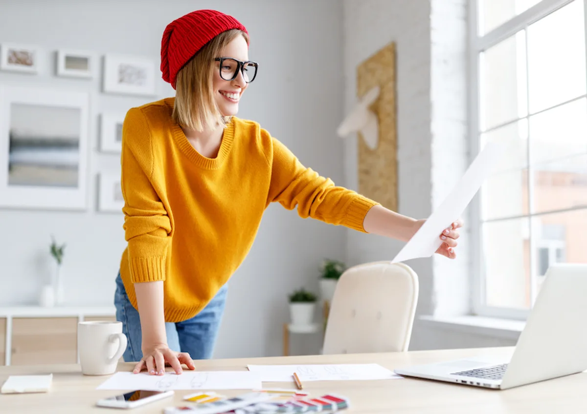 Freelancer managing tasks for a startup, highlighting the benefits of remote talent.