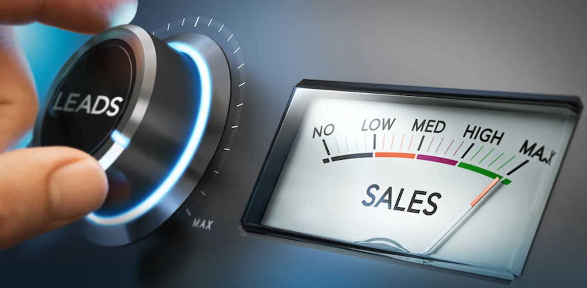 Hand flipping a switch from 'Leads' to 'Sales MAX', symbolizing the transition from lead generation to maximum sales in B2B email marketing.