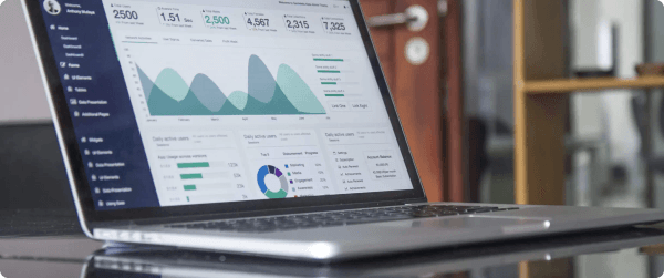 A laptop displaying analytics for a landing page.