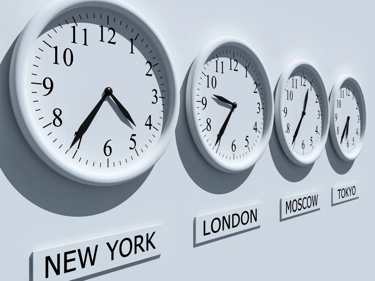 Wall clocks showing different time zones, emphasizing the need to adjust marketing emails based on audience location.