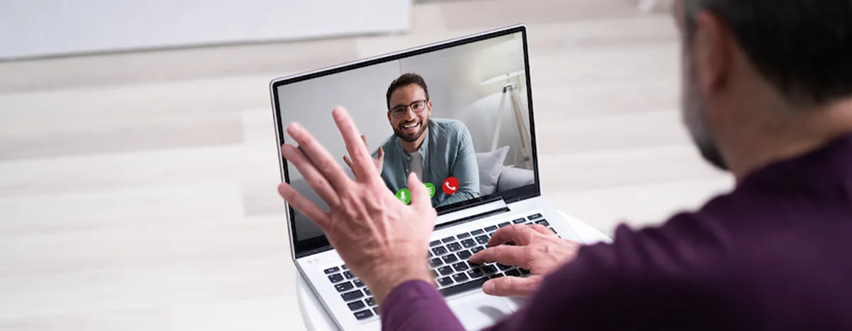 Founder on a video call with a freelancer, showcasing the ease of hiring through platforms like Upwork and Fiverr.